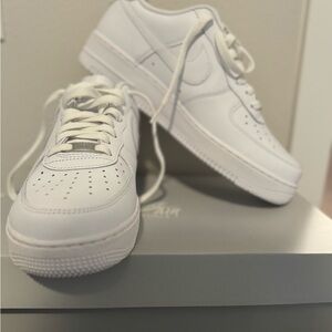 New in box.  Men’s Nike Air Force one 07.  Size 9.5 men’s.  All white.